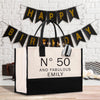 a black and white bag with a happy birthday sign on it