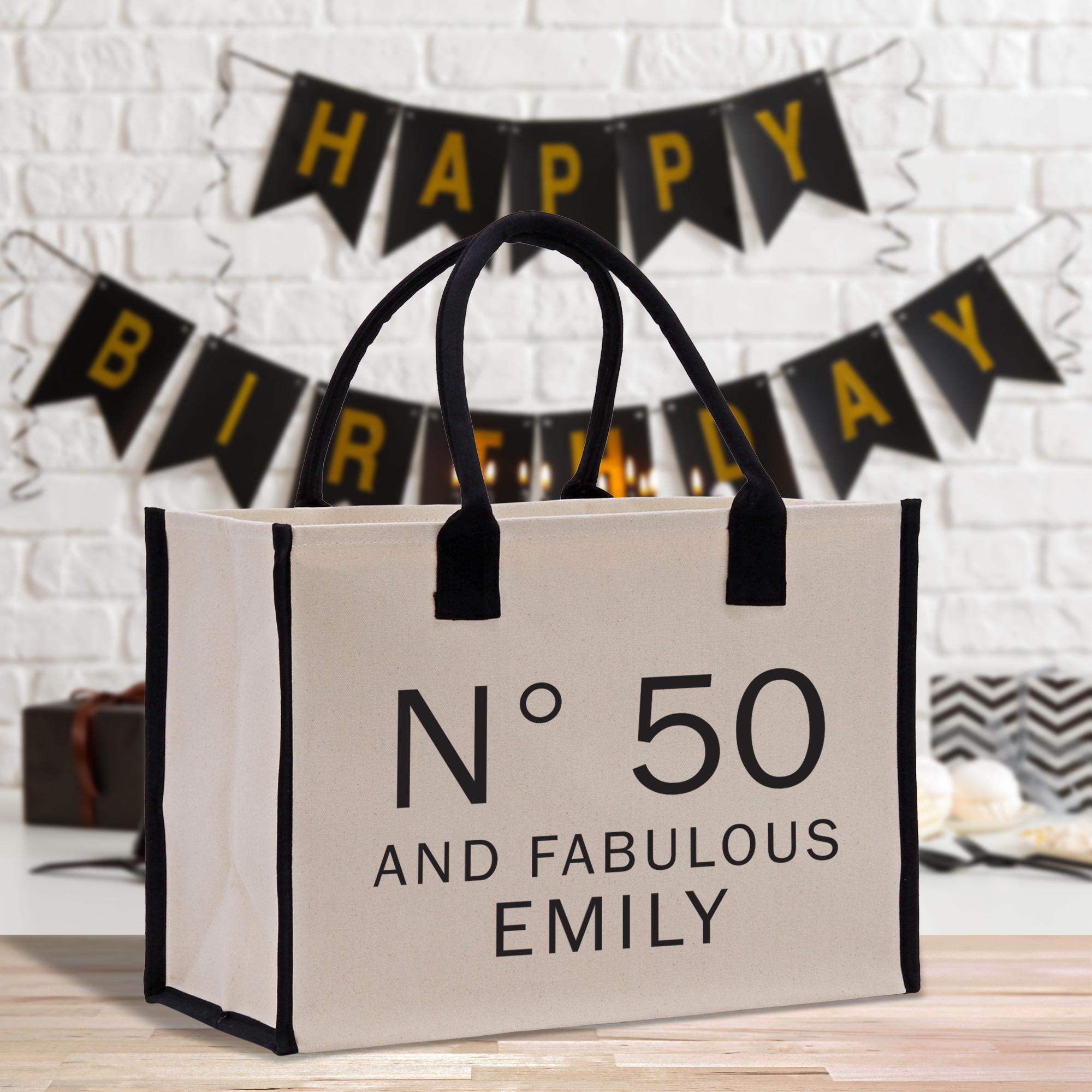 a black and white bag with a happy birthday sign on it