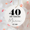 a white ornament with the number forty and fabulous marina