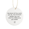 a ceramic ornament with a quote on it