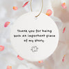 a white ornament with a puzzle piece saying thank you for being such an