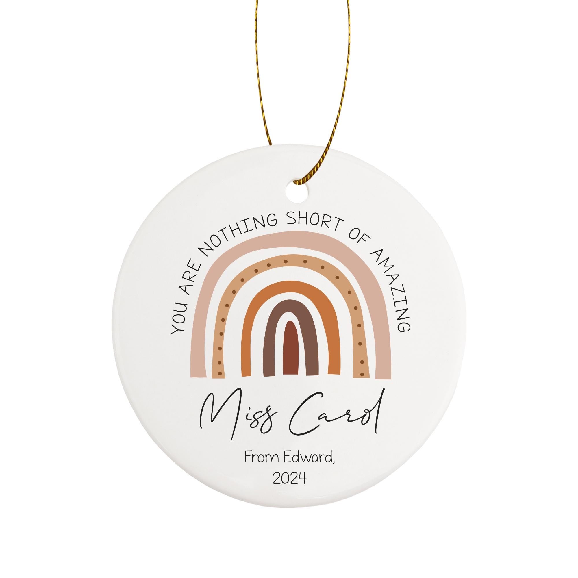 a ceramic ornament with a rainbow design