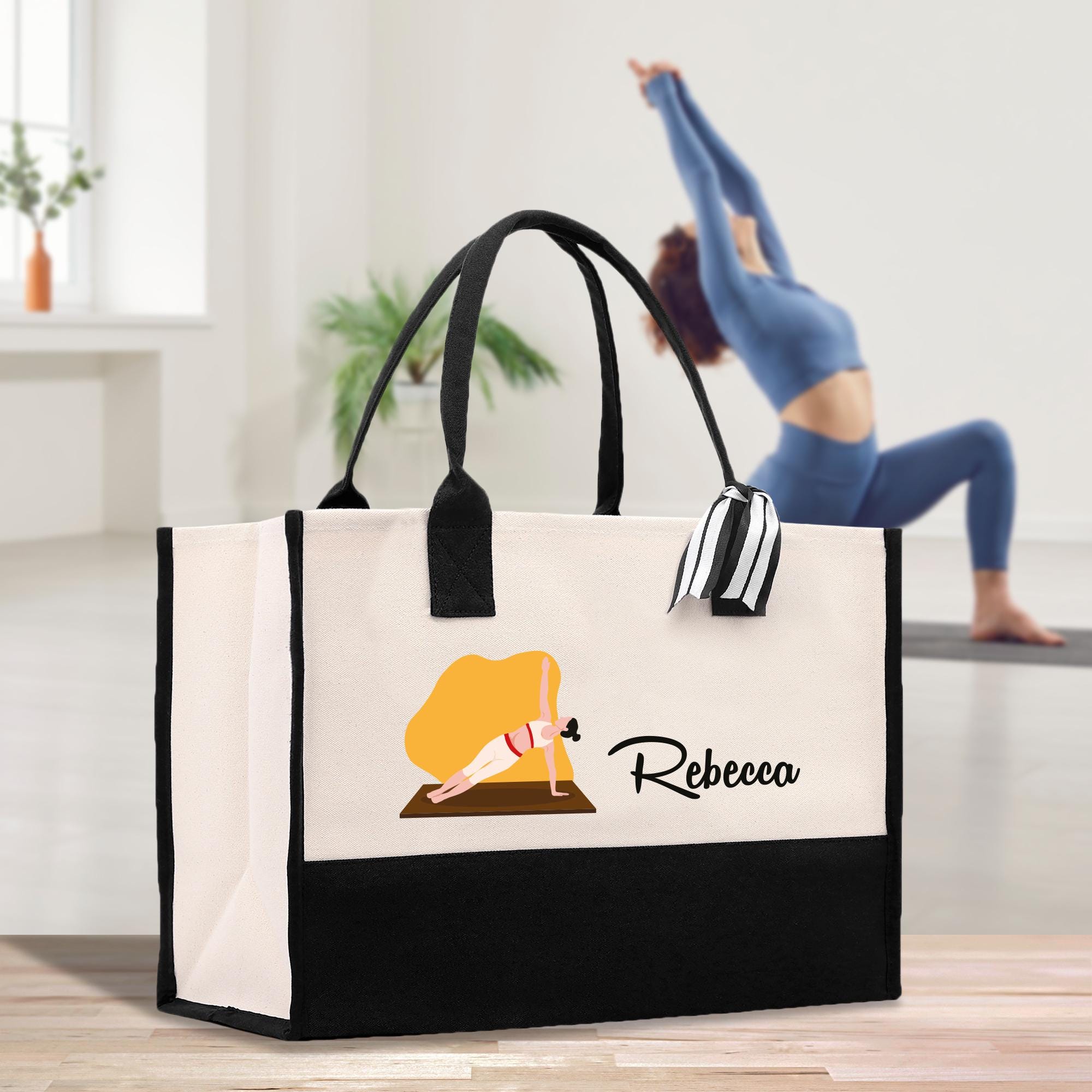 a woman doing a yoga pose with a reebee bag