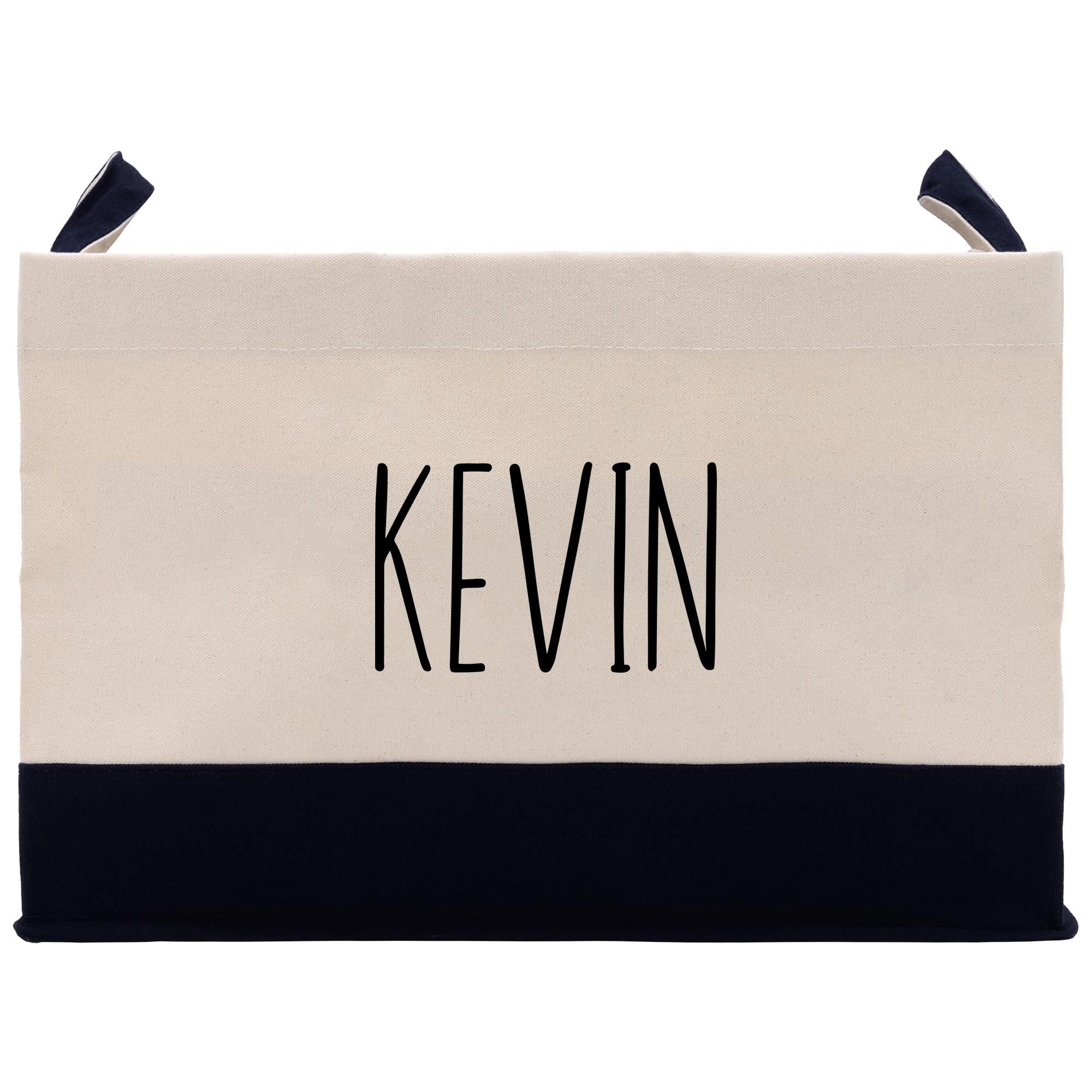 a black and white bag with a name on it