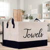 a white and black bag with the words towels on it