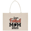 a tote bag with a football mom on it