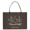 a christmas shopping bag with a merry and bright design