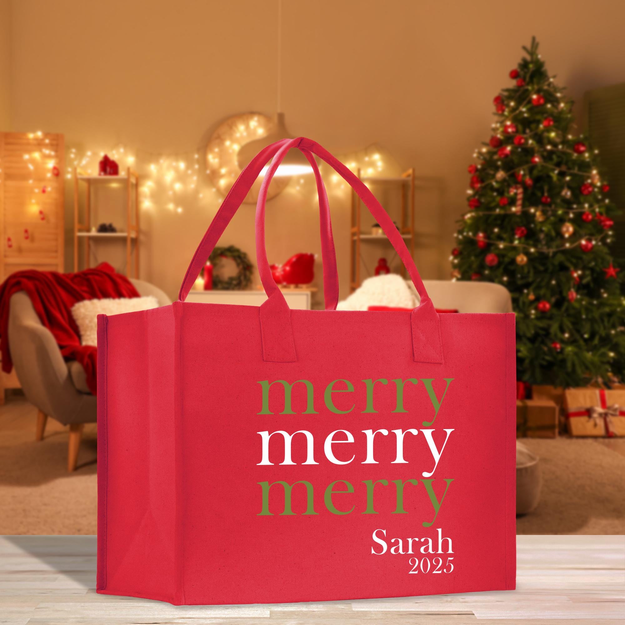 a red shopping bag with a merry message on it