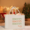 a white bag with a merry merry message on it