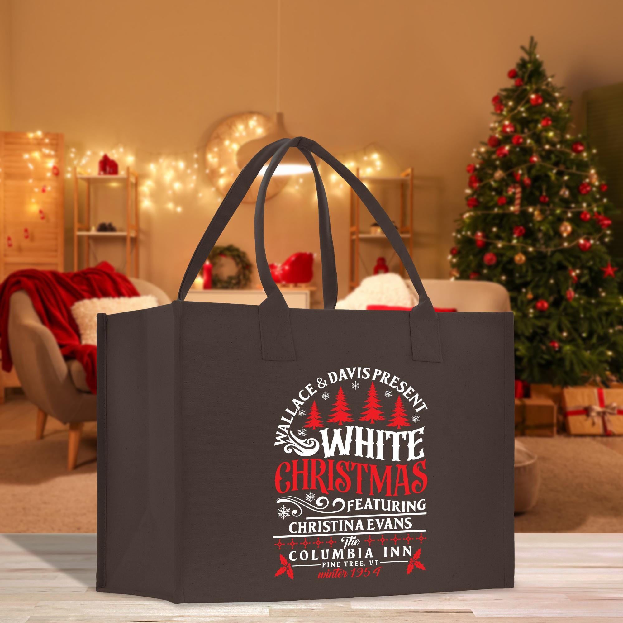 a black shopping bag with a christmas message on it