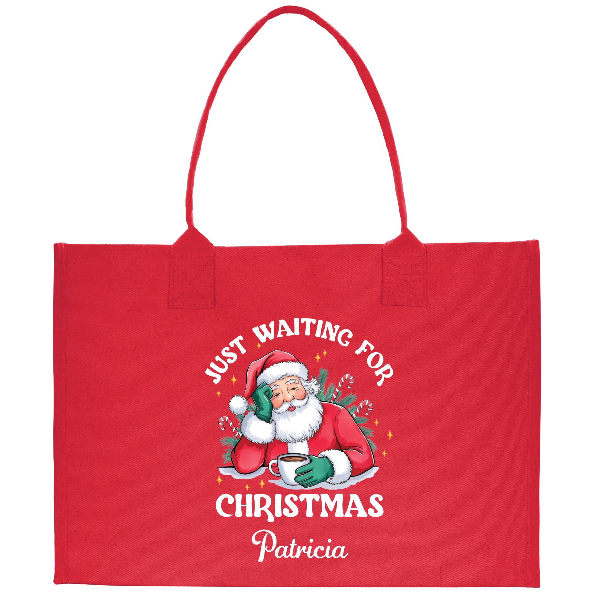 a red shopping bag with a santa clause on it