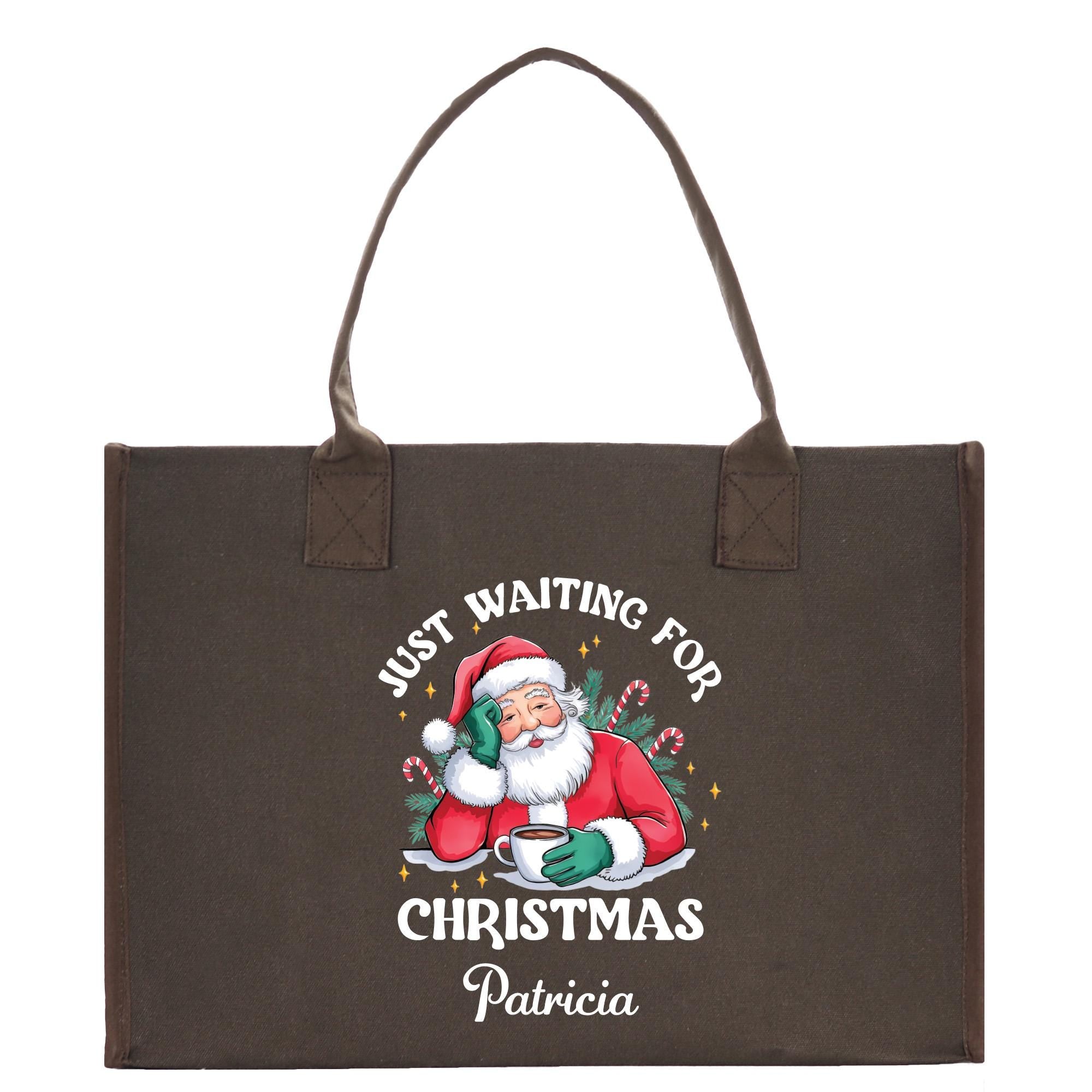 a christmas shopping bag with a santa clause on it