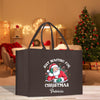 a christmas shopping bag with a santa clause on it