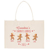 a white bag with three gingerbreads on it