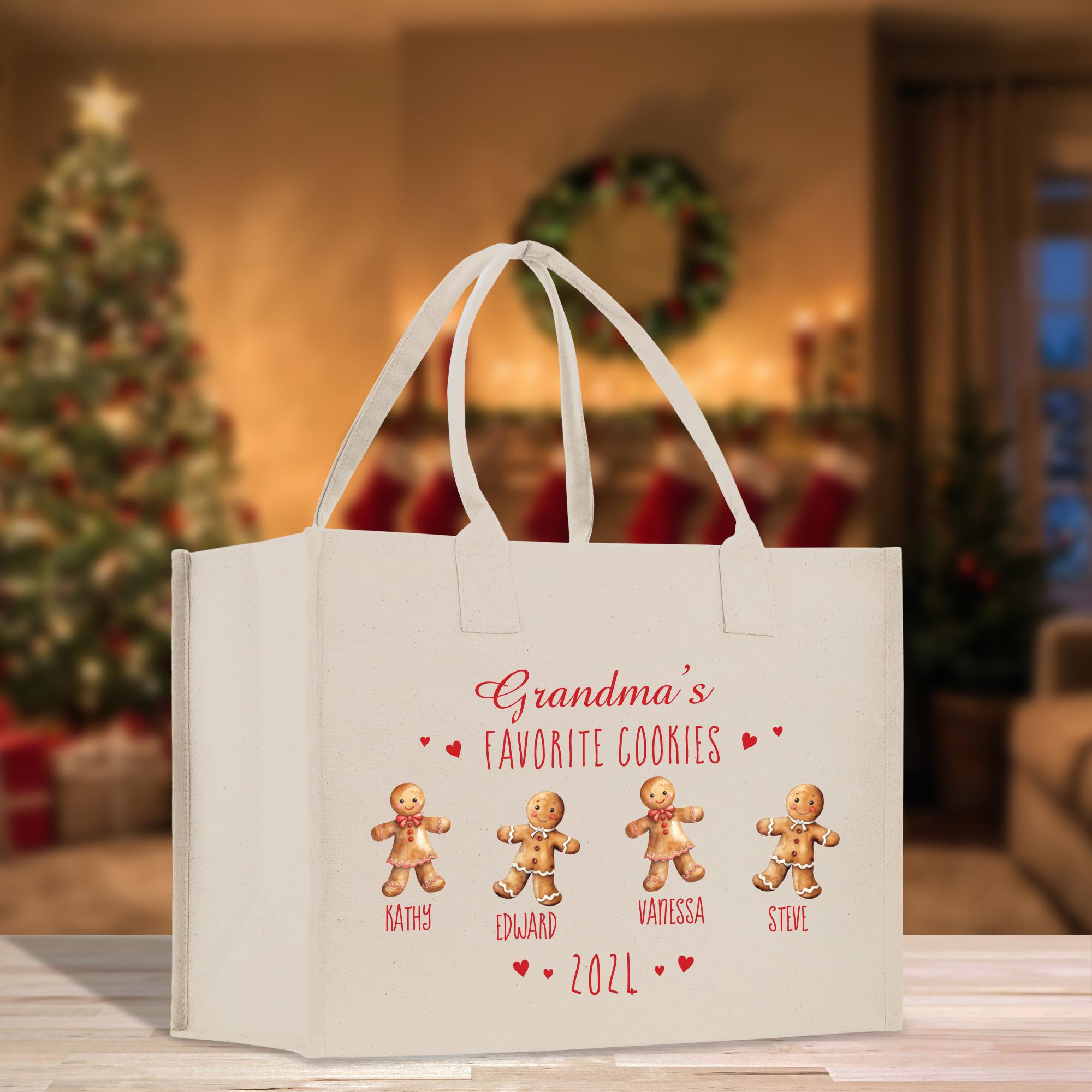 a white bag with three gingerbreads on it