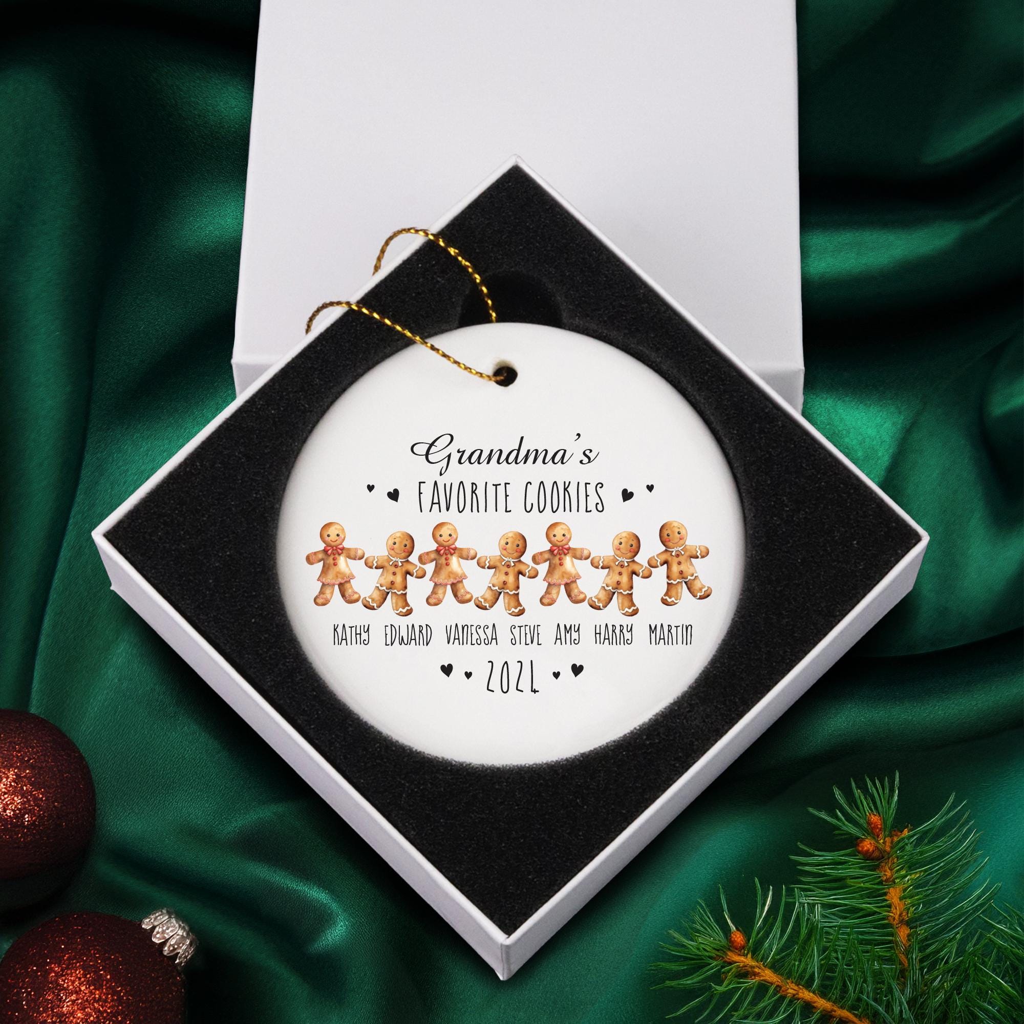 a christmas ornament with a picture of a group of gingers on it