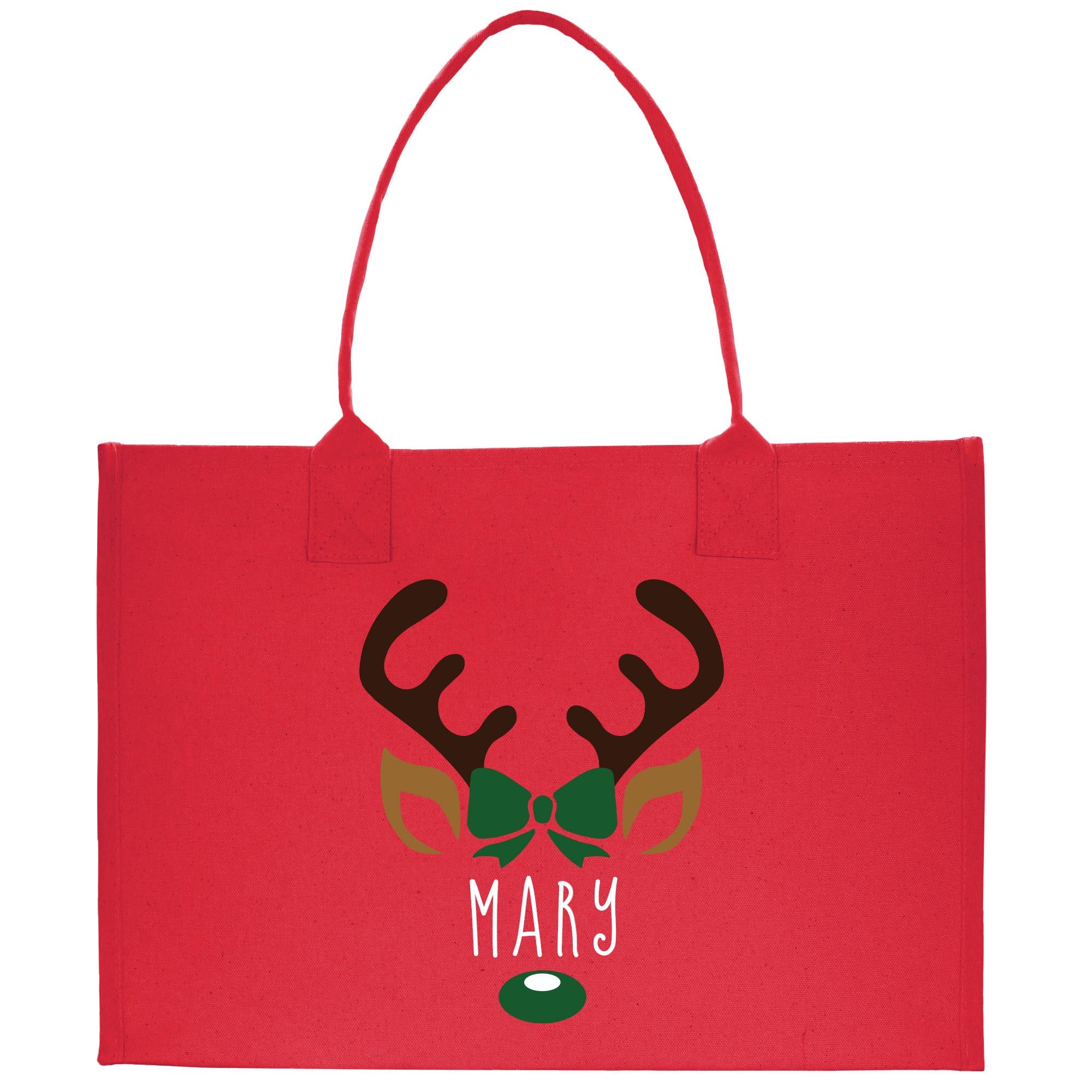 a red shopping bag with a deer&#39;s head on it