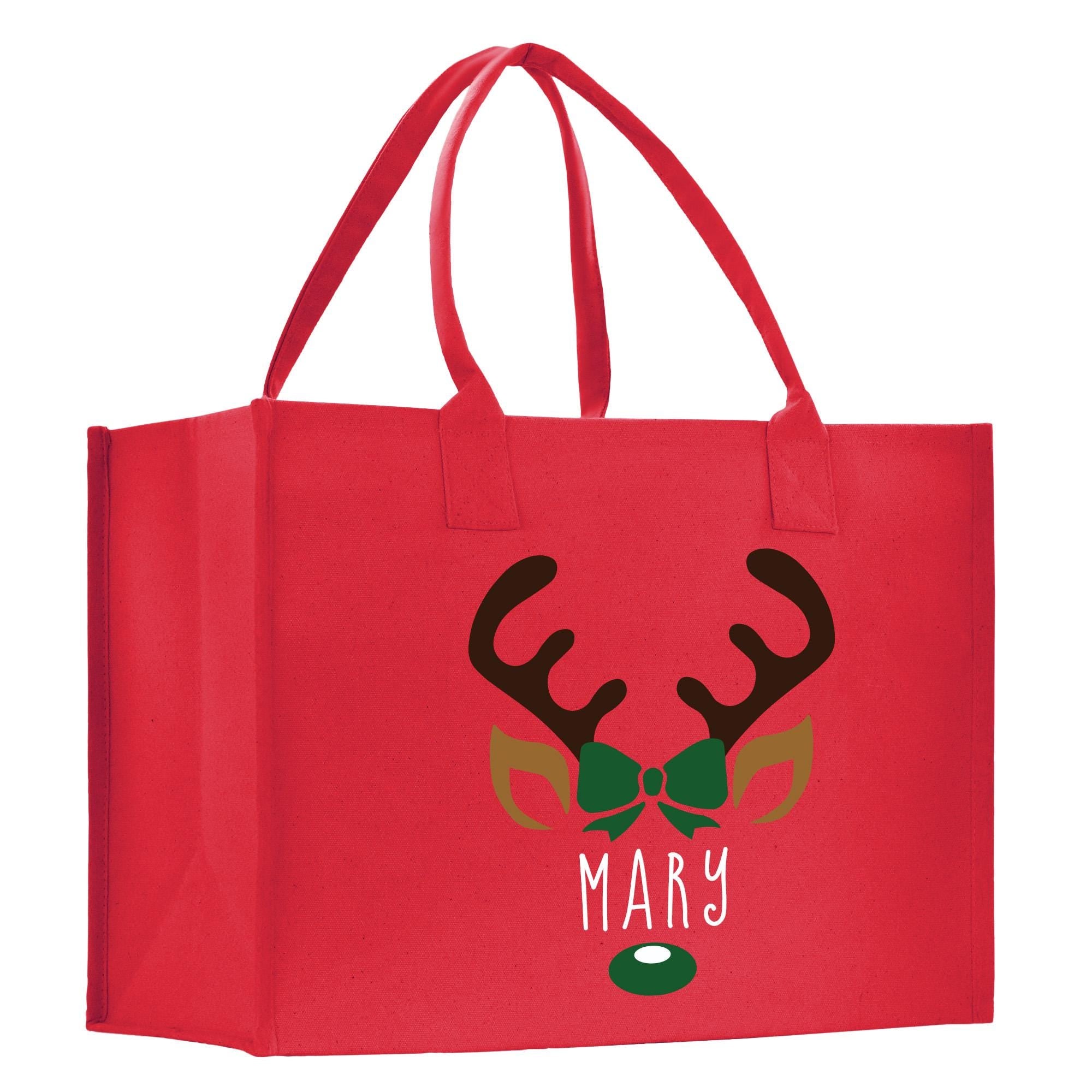 a red shopping bag with a deer&#39;s head on it