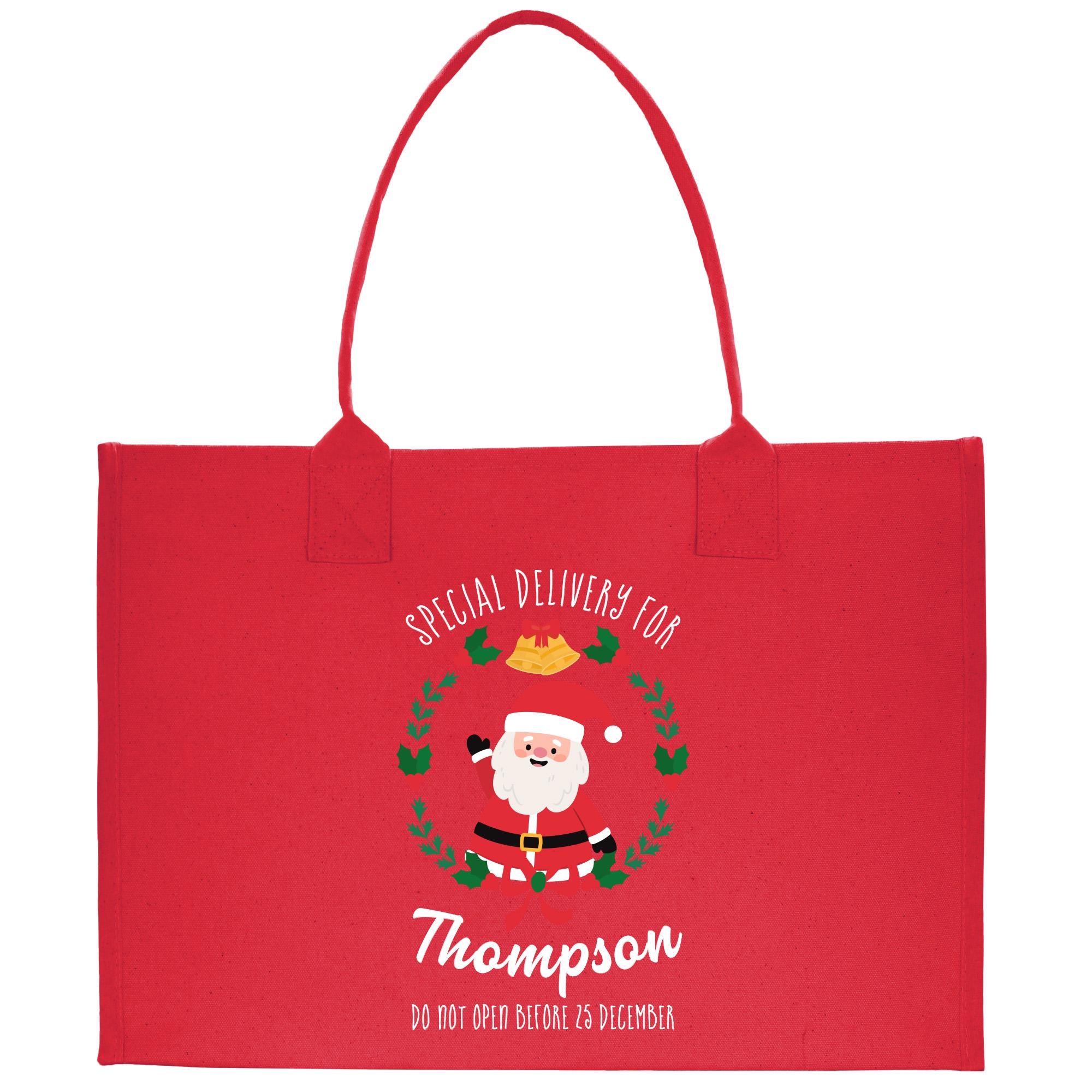 a red shopping bag with a santa clause on it