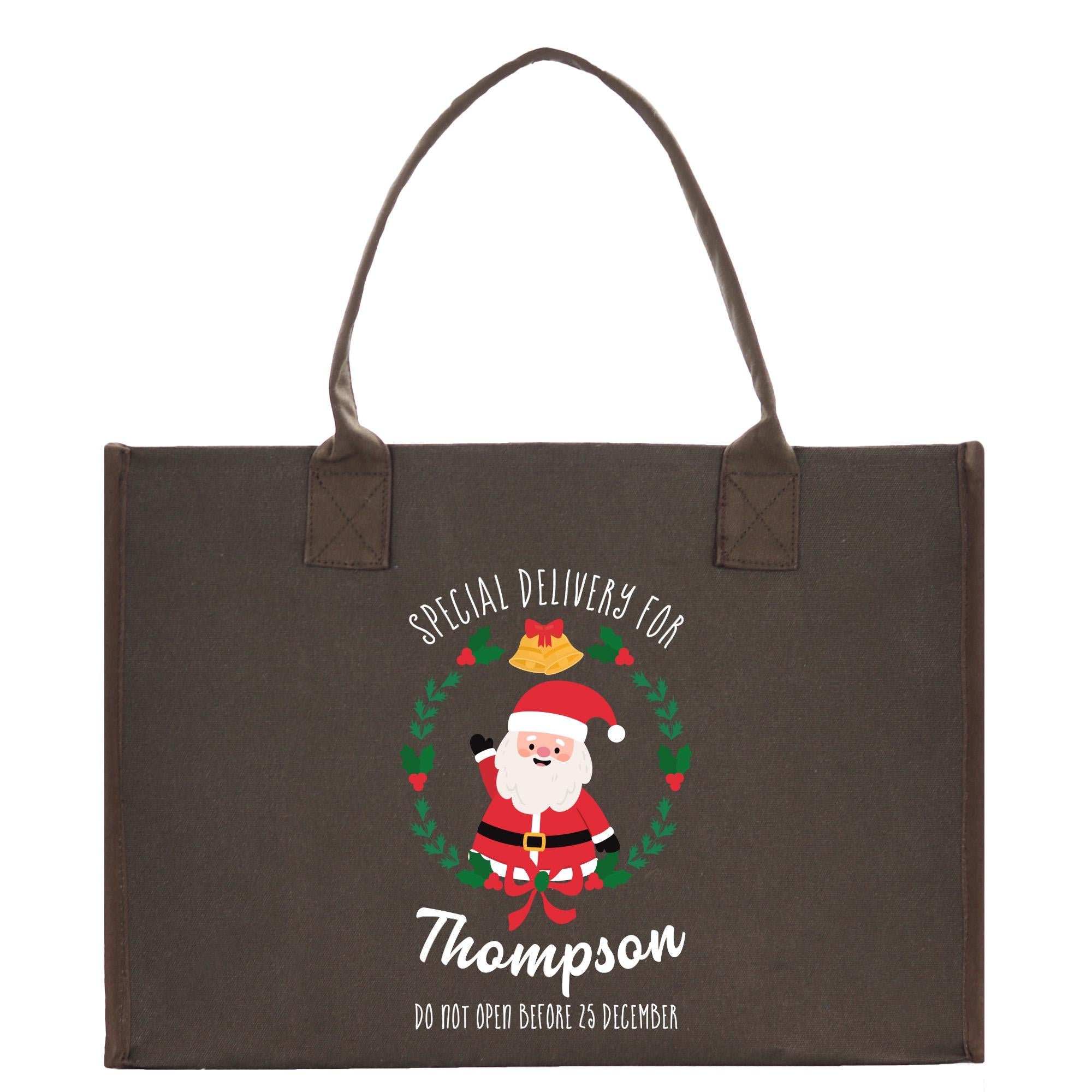 a brown shopping bag with a santa clause on it