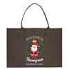 a brown shopping bag with a santa clause on it