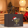 a black shopping bag with a menorah on it