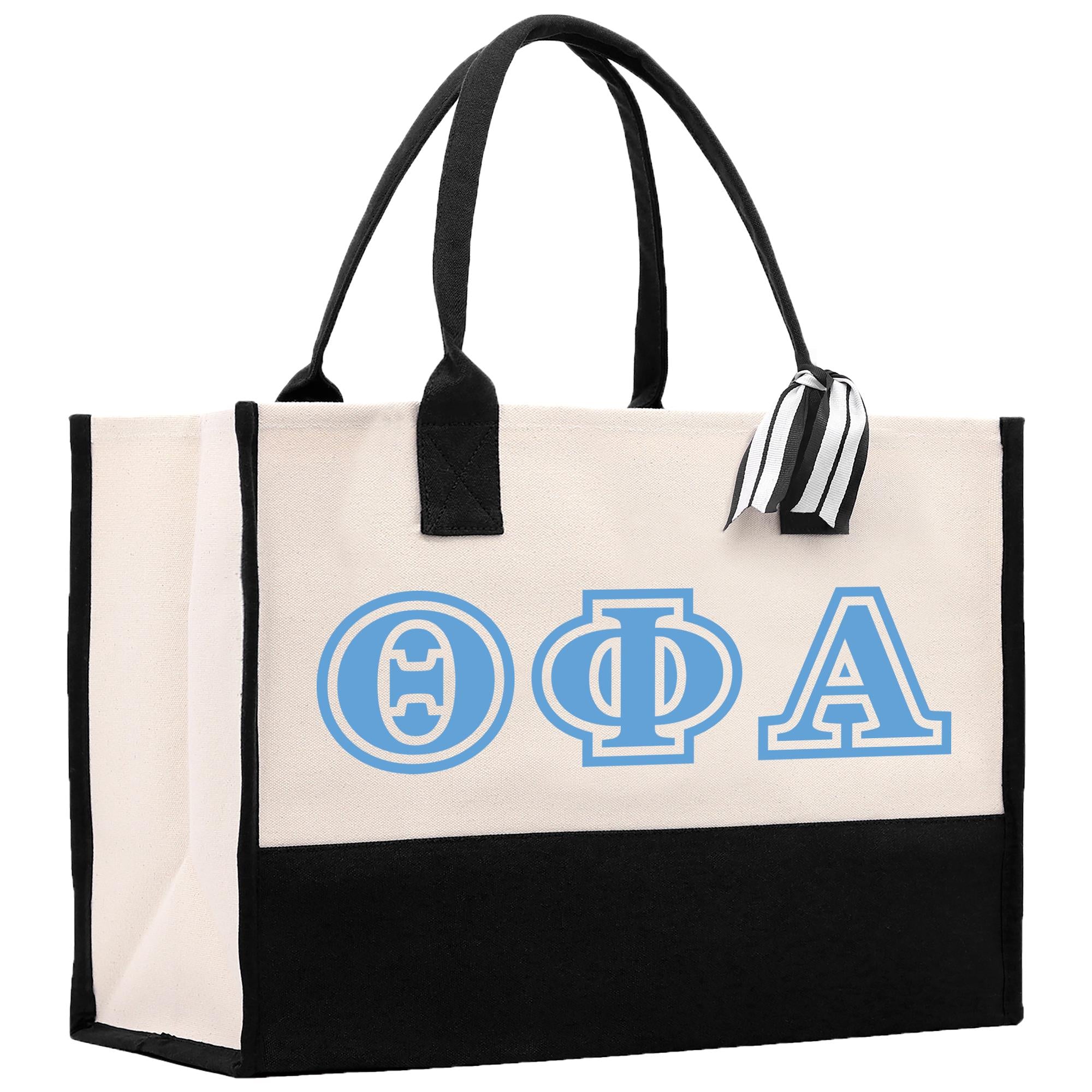 a black and white tote bag with blue letters