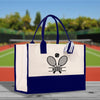 a white and blue bag with a tennis racket on it