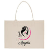 a tote bag with a woman's face and scissors