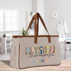 a canvas bag with a name and a leopard print