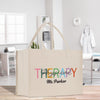 a canvas bag with the words therapy on it