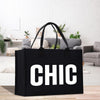 a black bag with the word chic printed on it