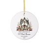 a christmas ornament with a house on it