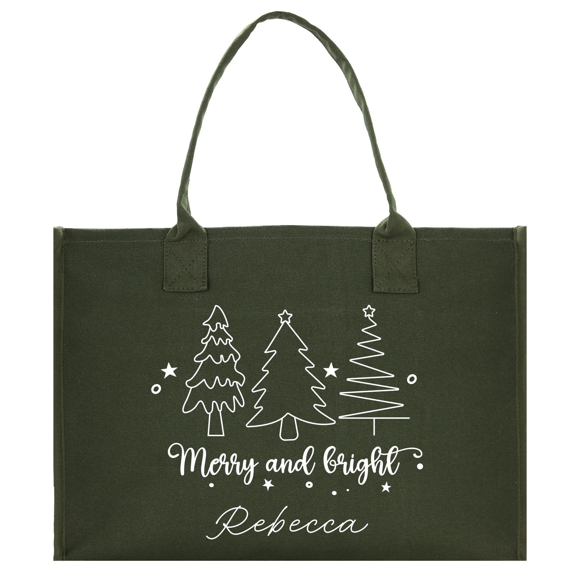 a green shopping bag with a merry and bright design