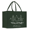 a green shopping bag with a merry and bright design