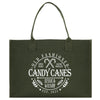 a green bag with the words candy canes on it