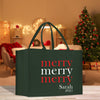 a christmas shopping bag sitting on the floor in front of a christmas tree