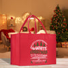 a red shopping bag sitting on top of a table