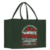 a green shopping bag with a white christmas message