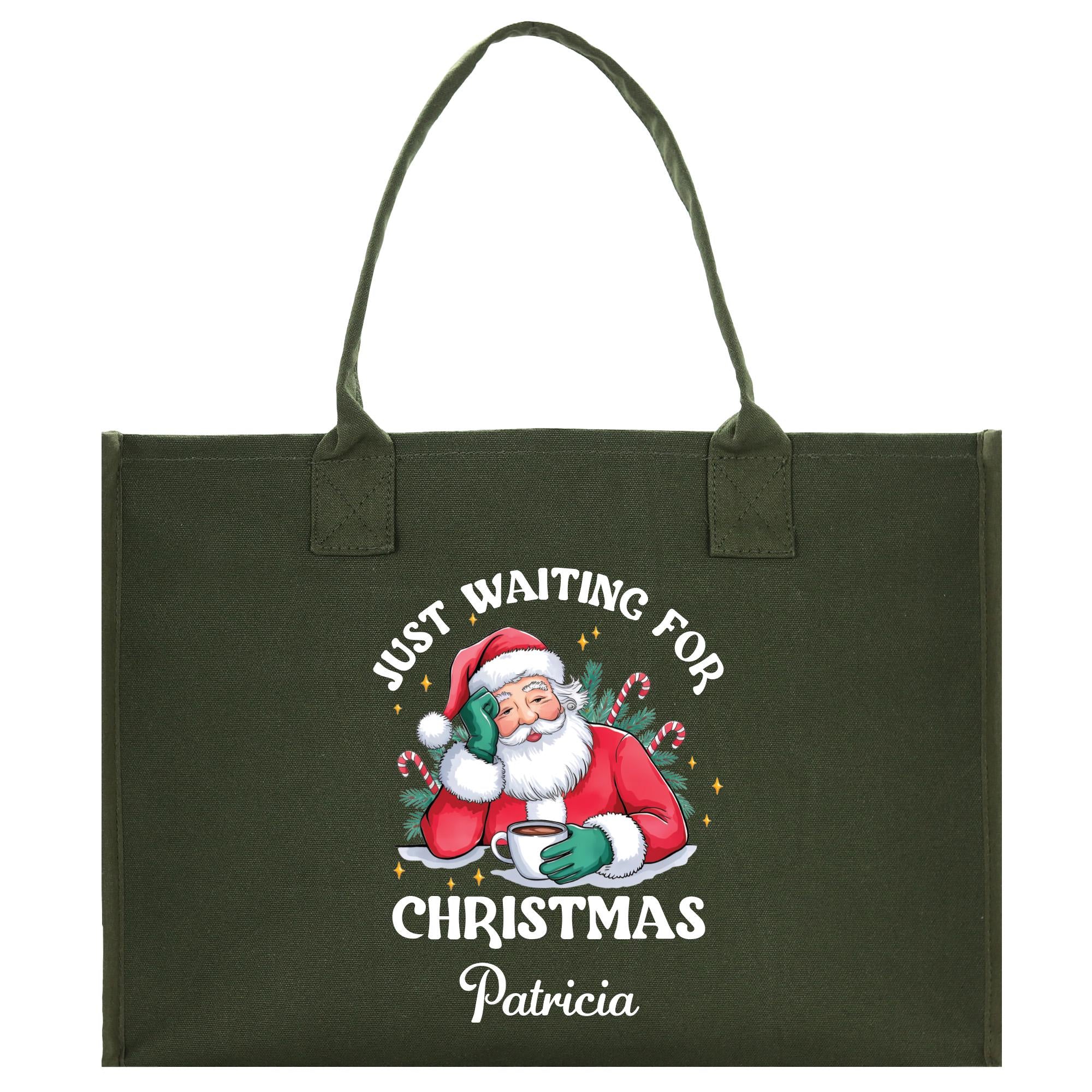 a christmas shopping bag with a santa clause on it