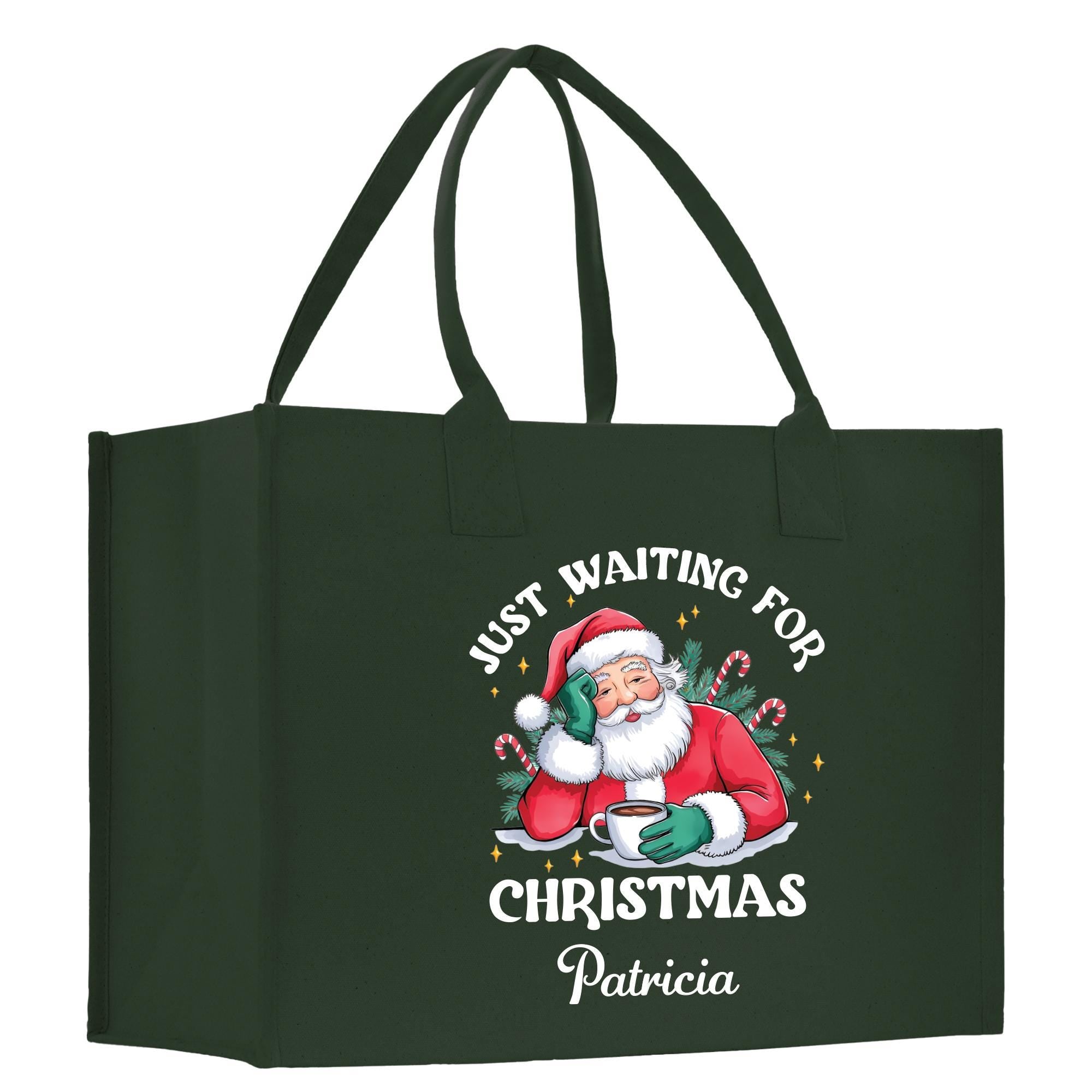 a christmas shopping bag with a santa clause on it