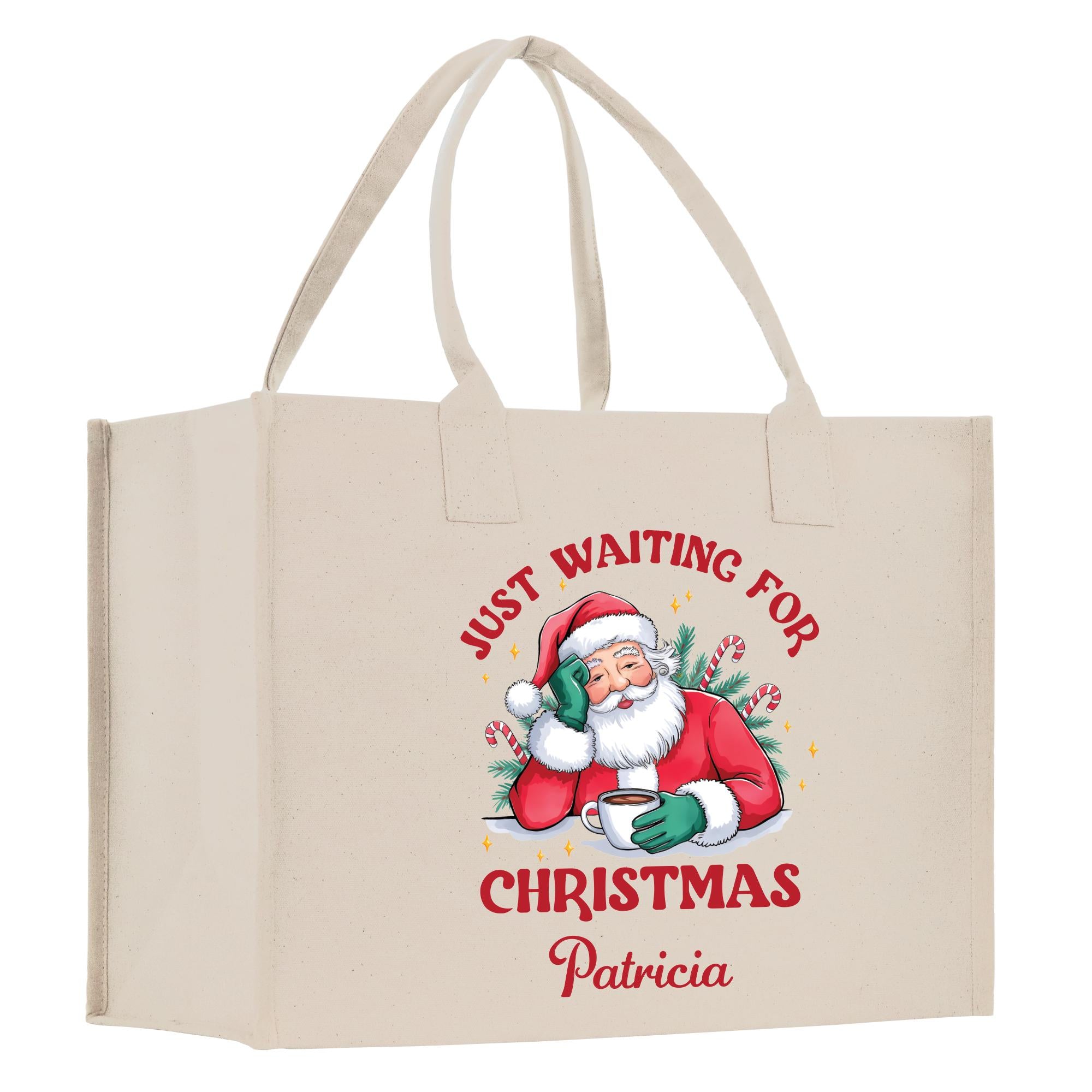 a christmas shopping bag with a santa clause on it