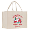 a christmas shopping bag with a santa clause on it