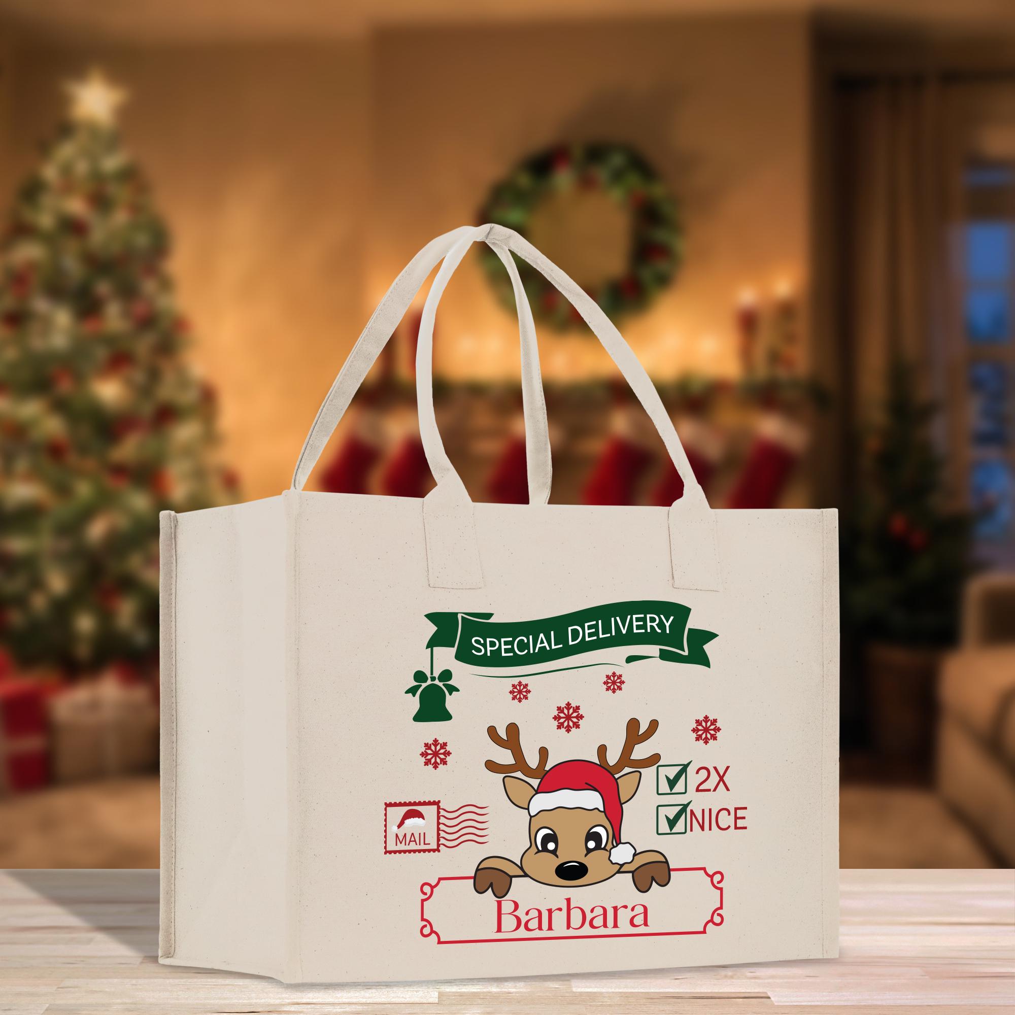 a white shopping bag with a reindeer on it