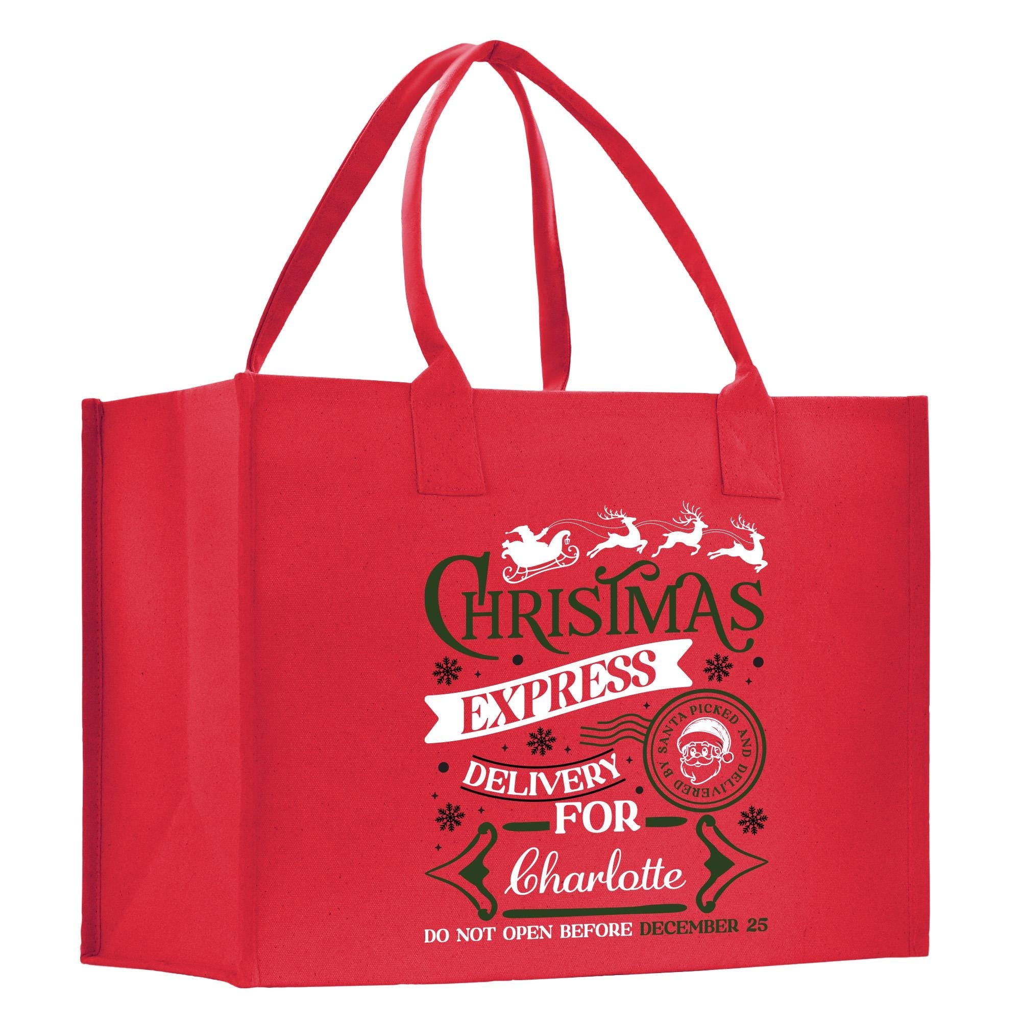 a red shopping bag with a christmas message on it