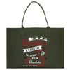 a green christmas shopping bag with a santa clause on it