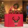 a red shopping bag with a reindeer's head on it