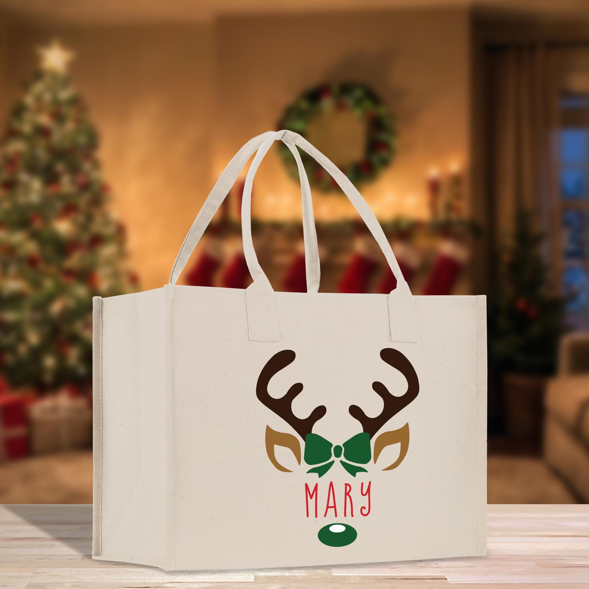 a white shopping bag with a reindeer&#39;s face on it