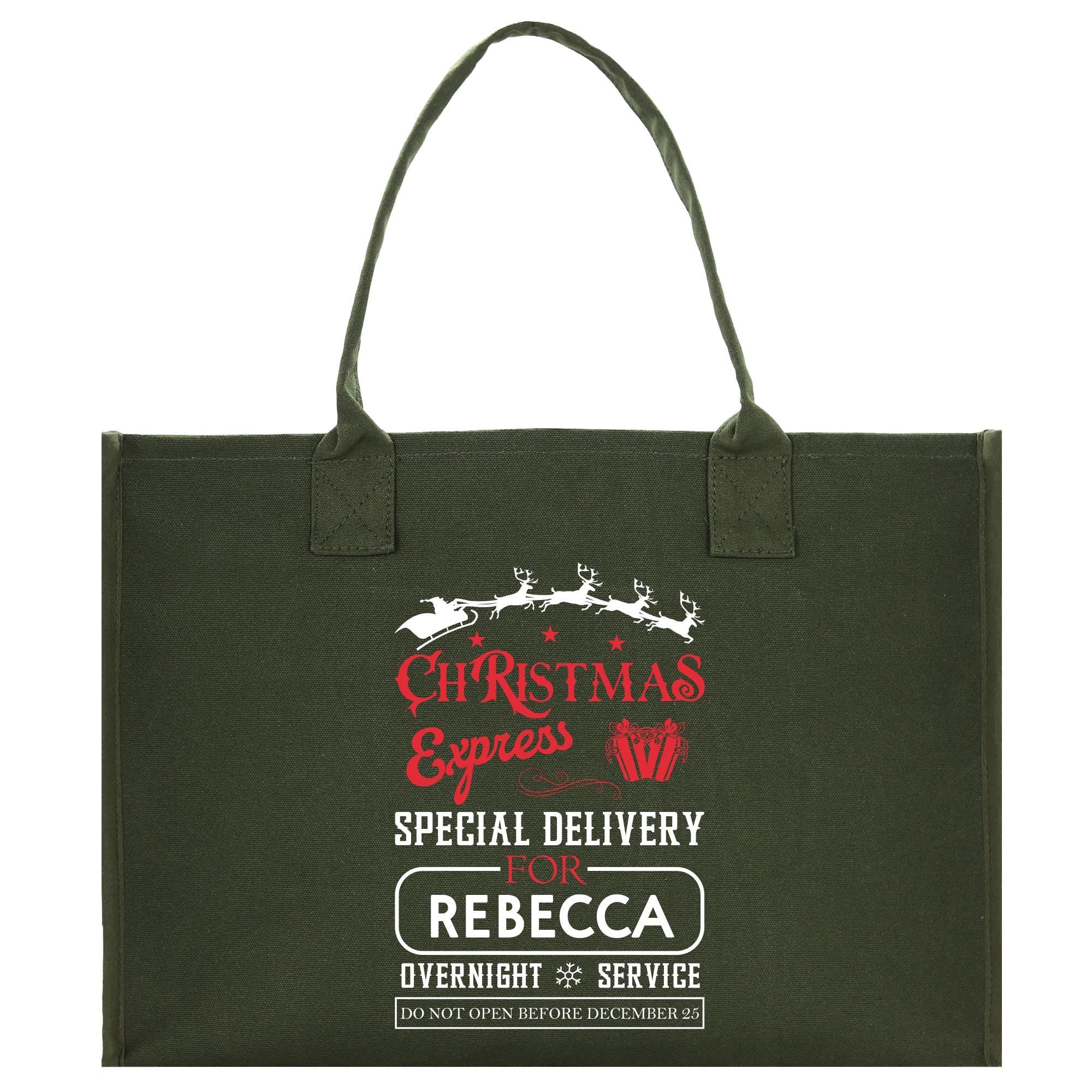 a green christmas shopping bag with santa&#39;s sleigh on it