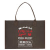 a brown christmas shopping bag with santa's sleigh on it